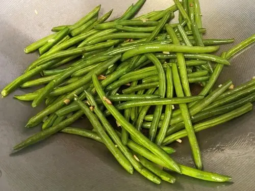 chinese stir-fried green beans beans in pan